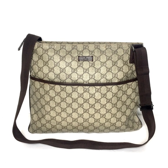 Gucci Handbags - Authentic Gucci brown monogram coated canvas unisex crossbody bag
